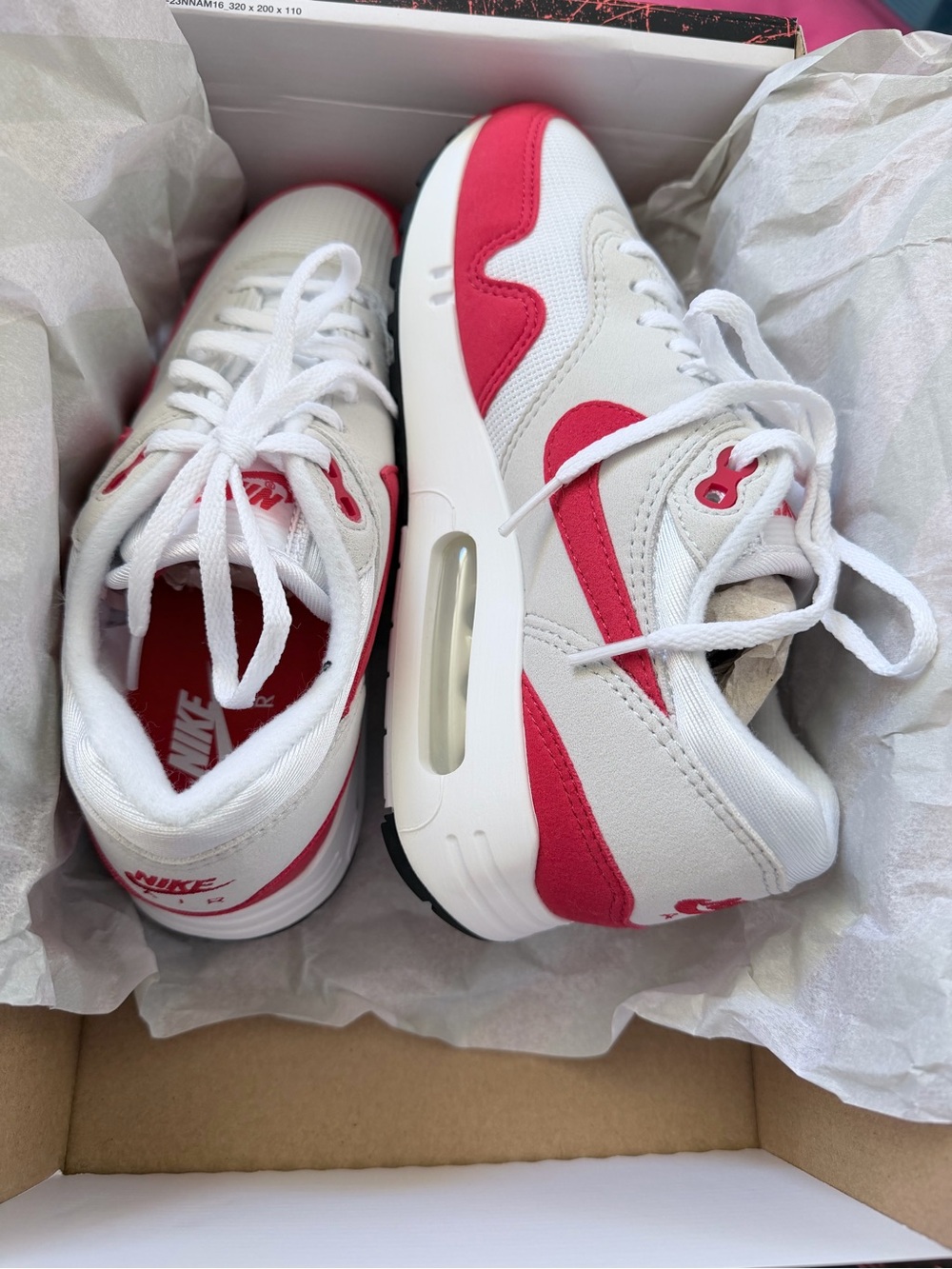 Nike Women's White and Red Low-Top Air Sneakers